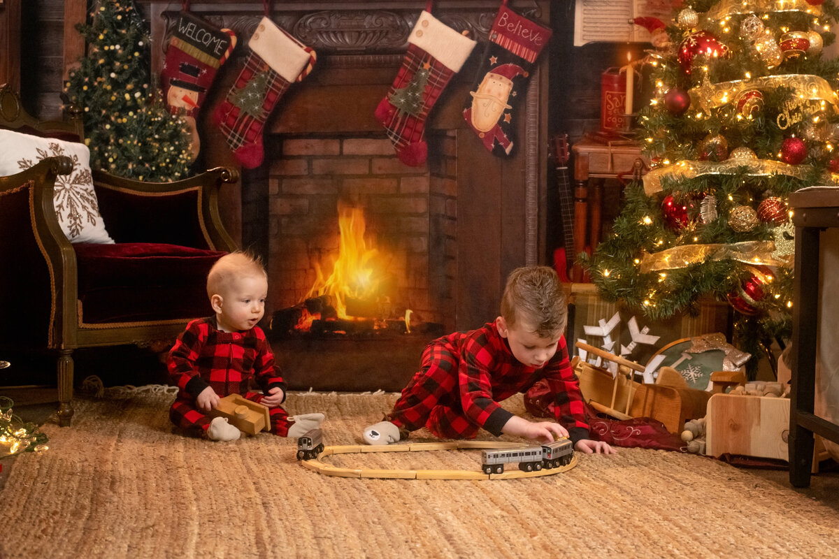 Brothers play Christmas train