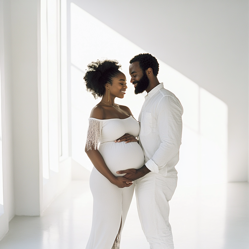 kdurski_86694_a_young_pregnant_black_woman_holding_her_belly_in_7e0d310f-5617-44de-a8cf-2dd760ca8f36