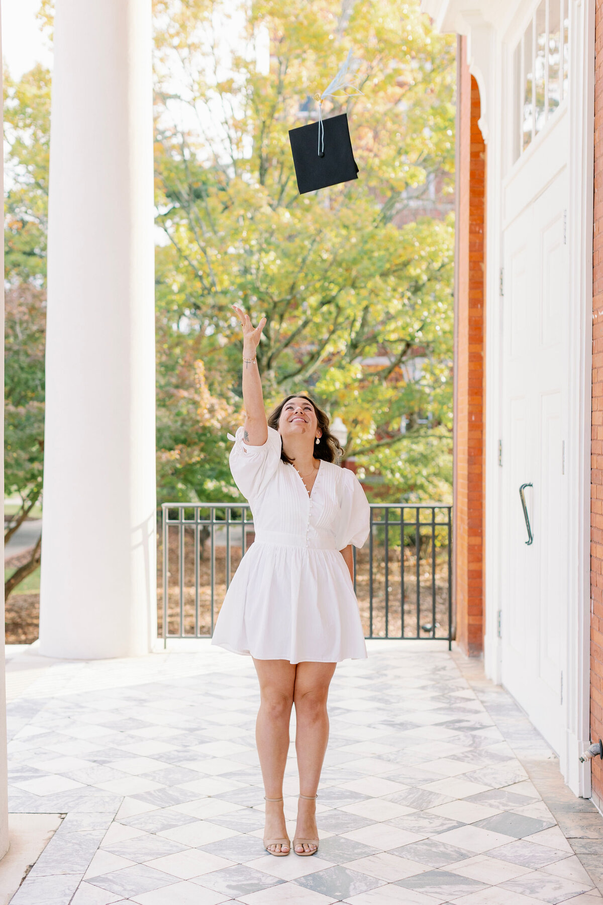 Auburn graduate throwing cap