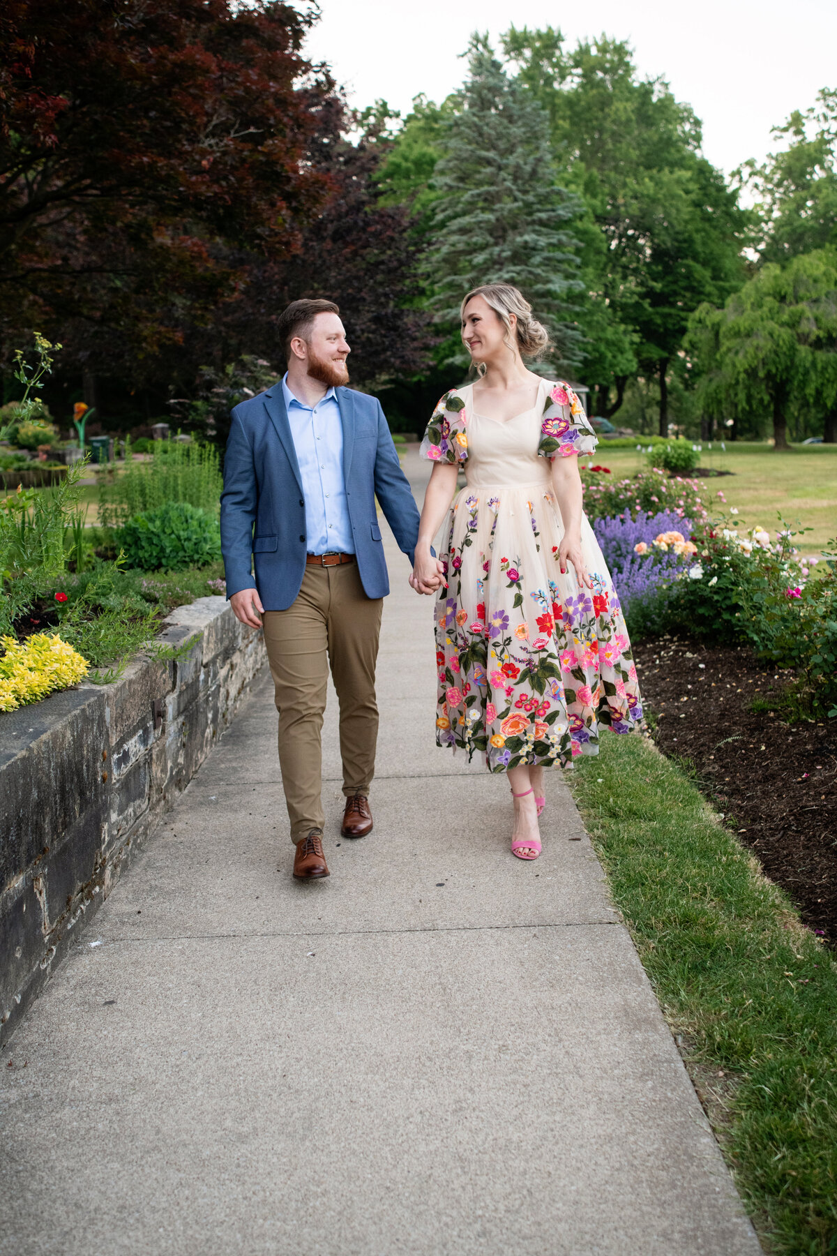 Couple walks down walkway at Canton Garden Center