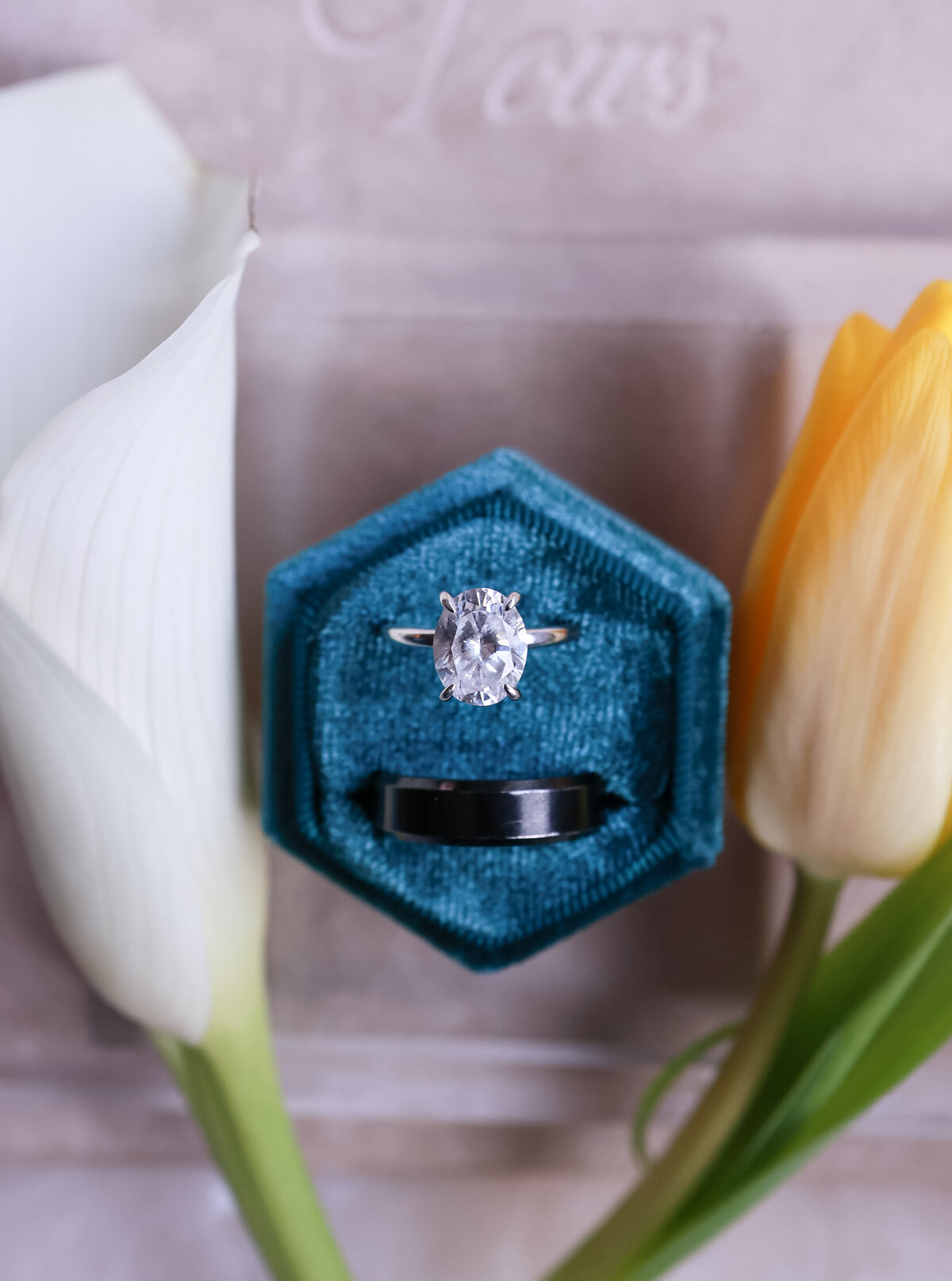 wedding rings with calla lillies in background by Atlanta Georgia wedding photographer Amanda Richardson Photography