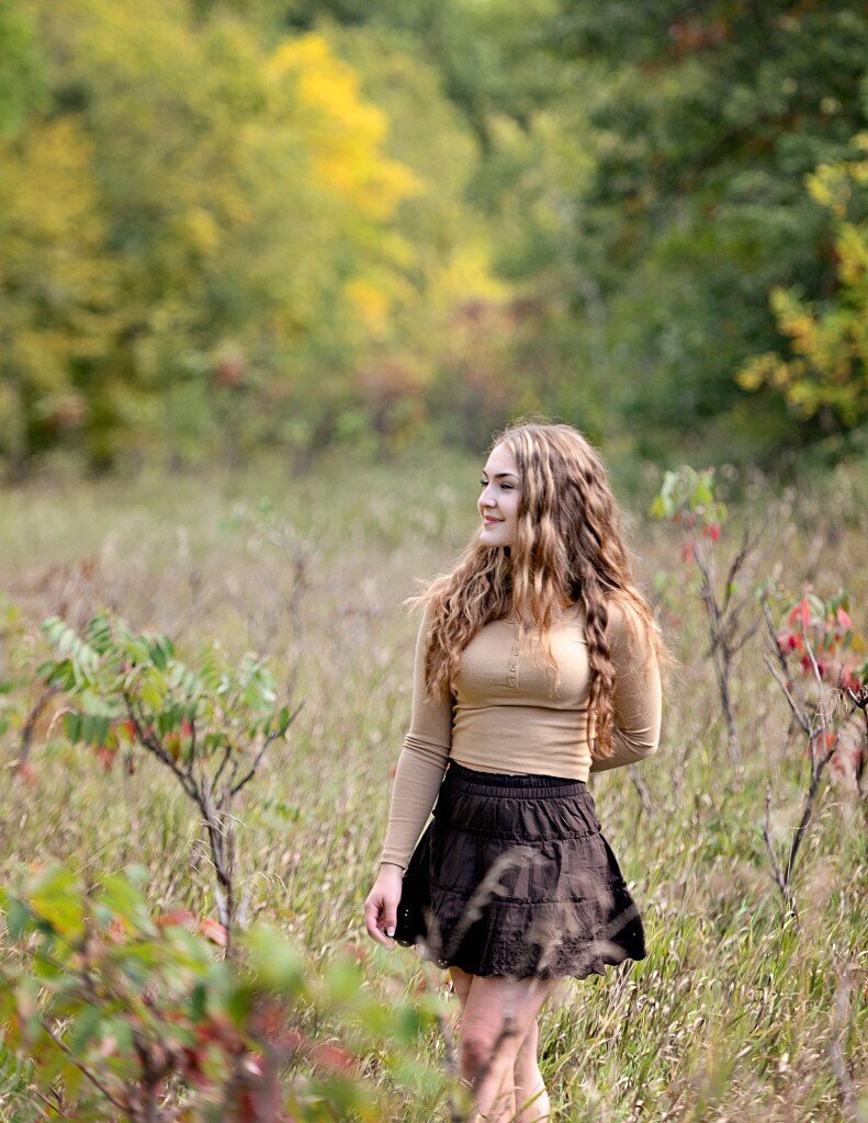 senior girl in field