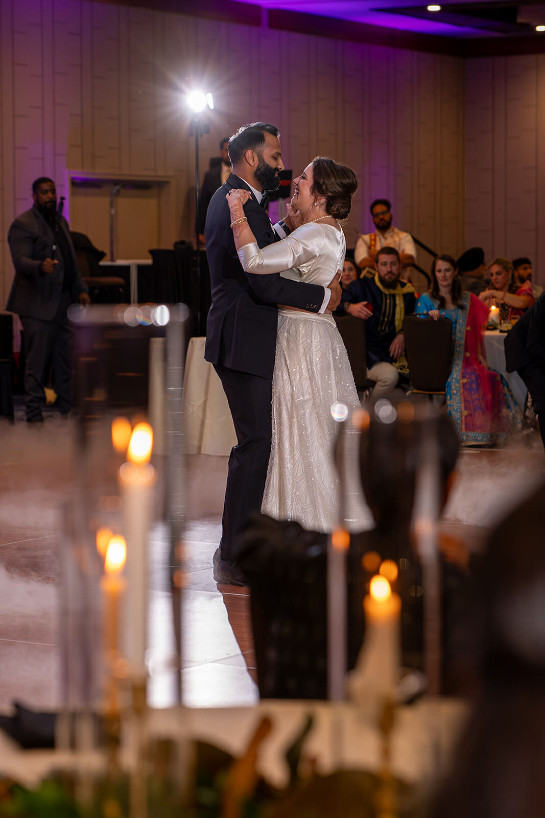 A newlywed couple during their first dance 