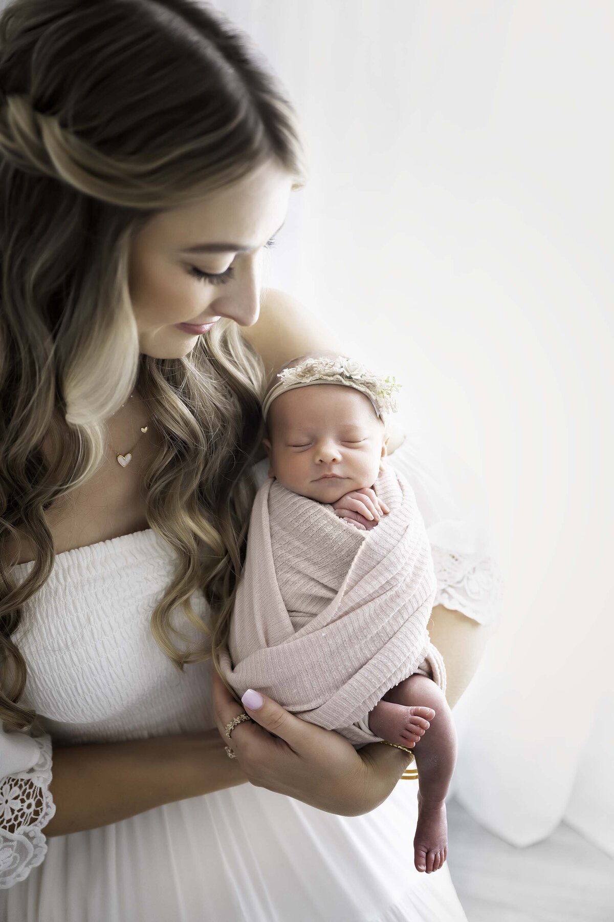 Mom and Baby Girl in Pink Wrap - Studio Session