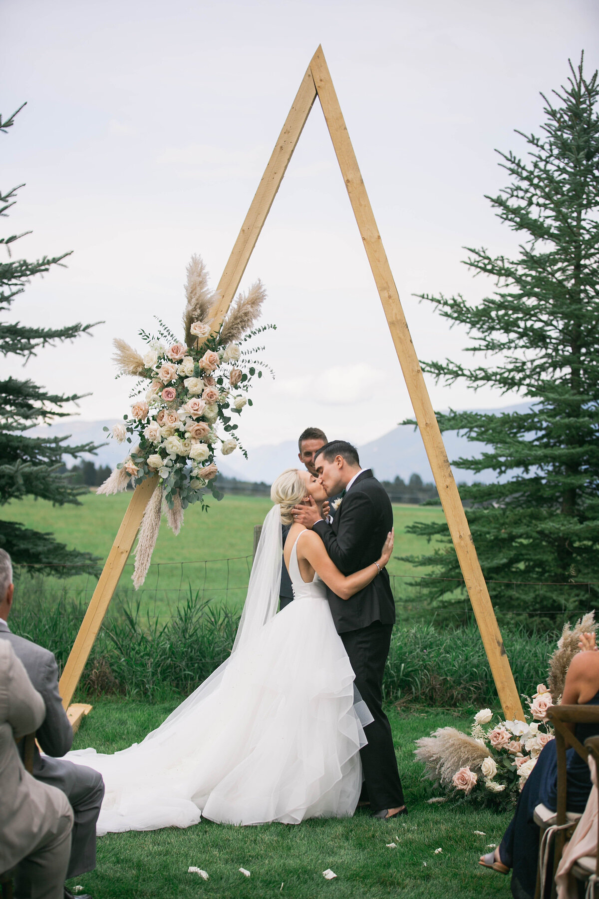 bride and groom kissing