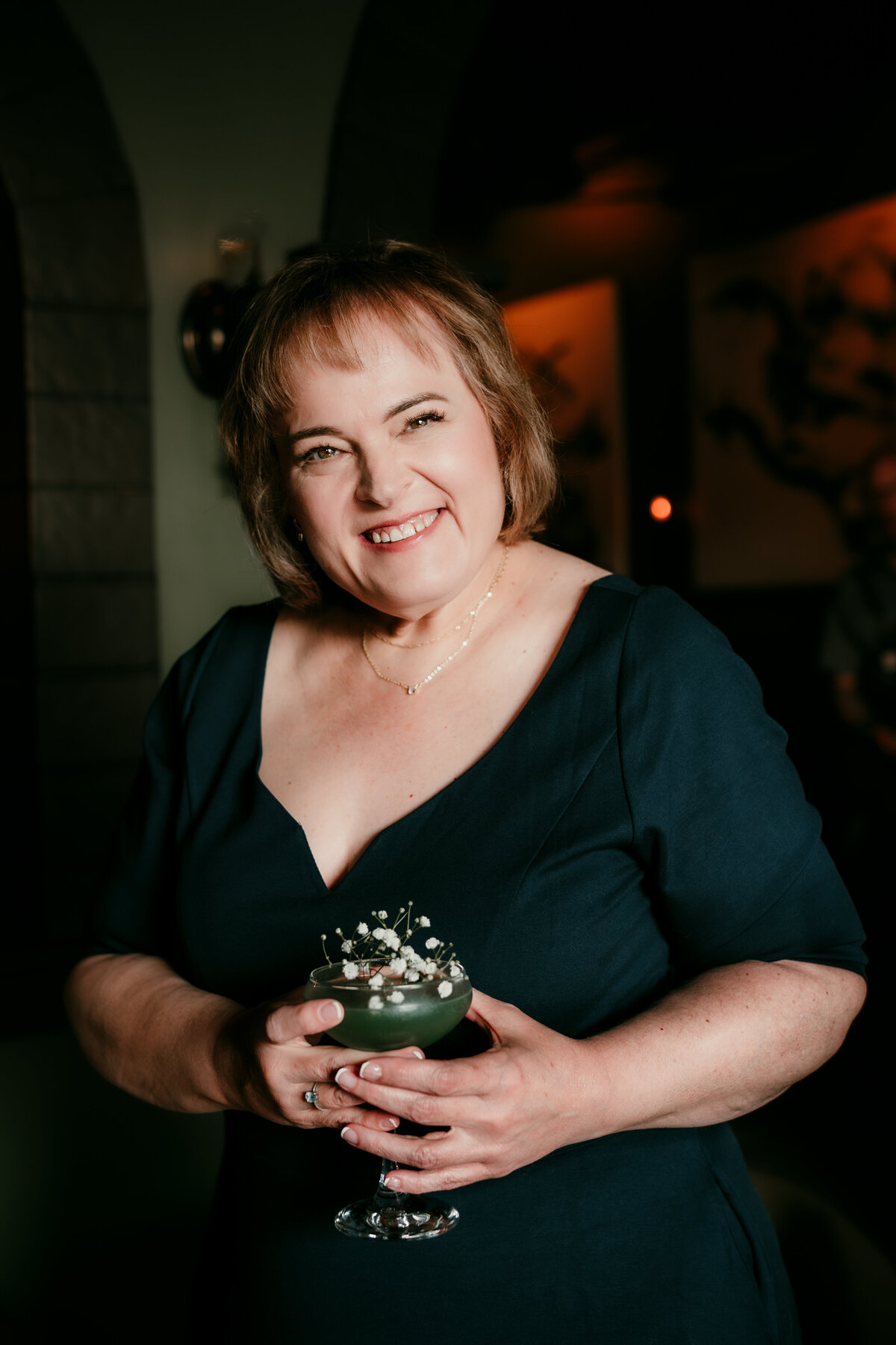Empowering online dating portraits of a 50+ woman captured in natural Twin Cities locations