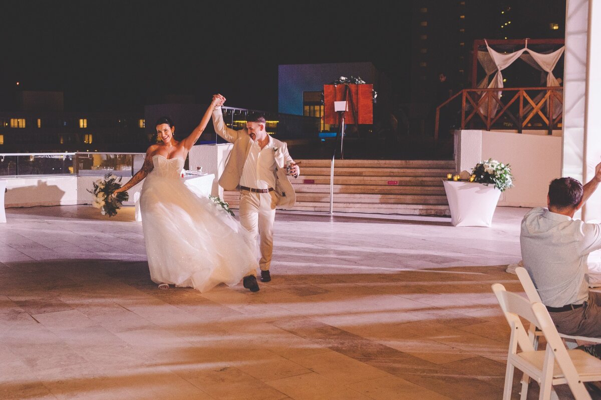 Bride and grooms entrance to reception in Cancun