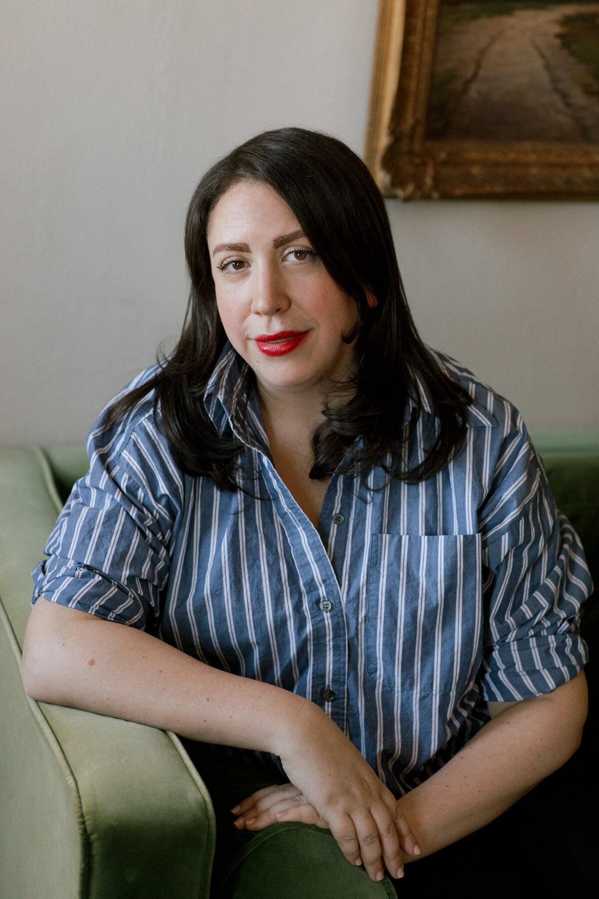 author portrait of hilary leichter wearing a striped shirt