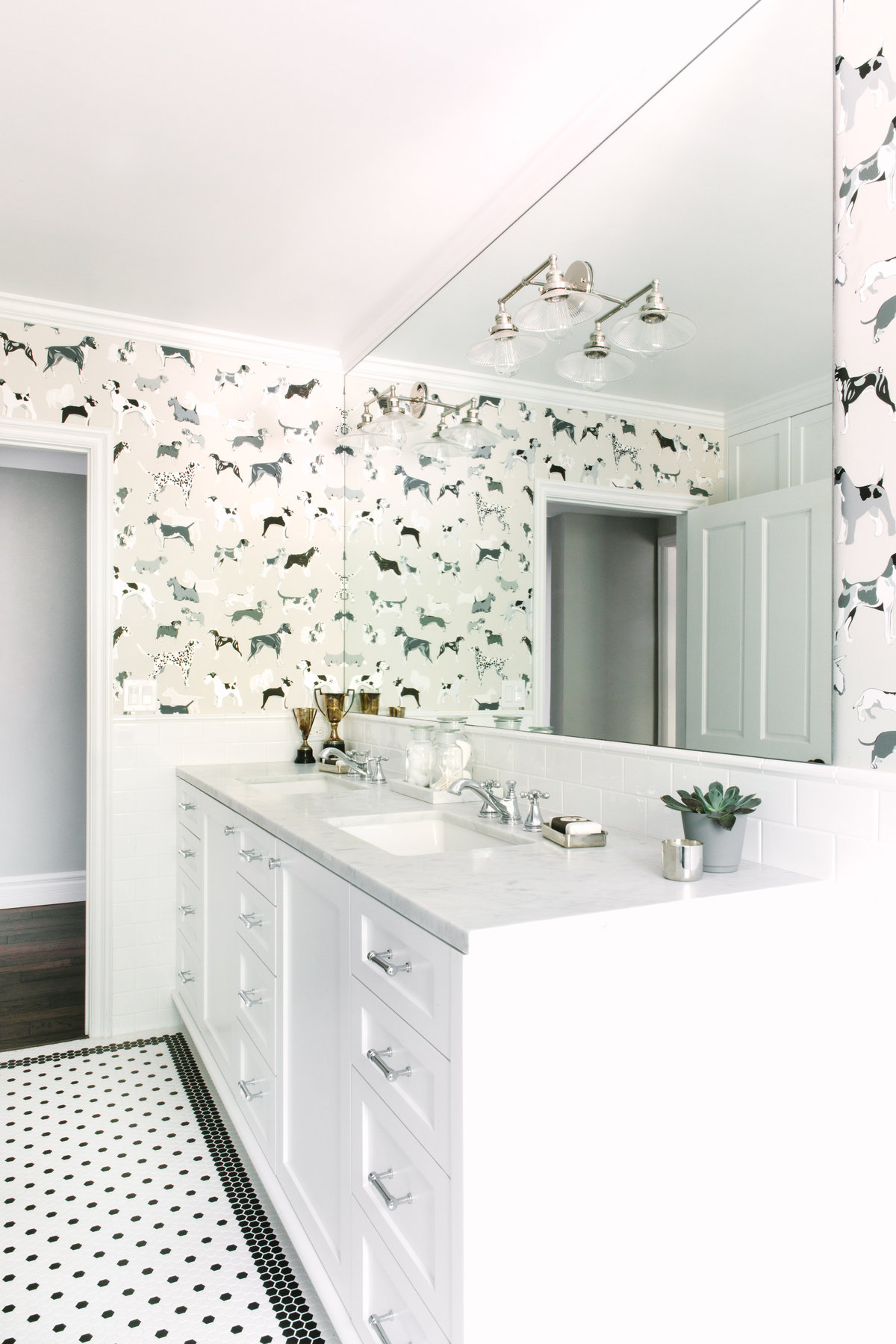 Boys bathroom with white vanity and Carrara marble countertop