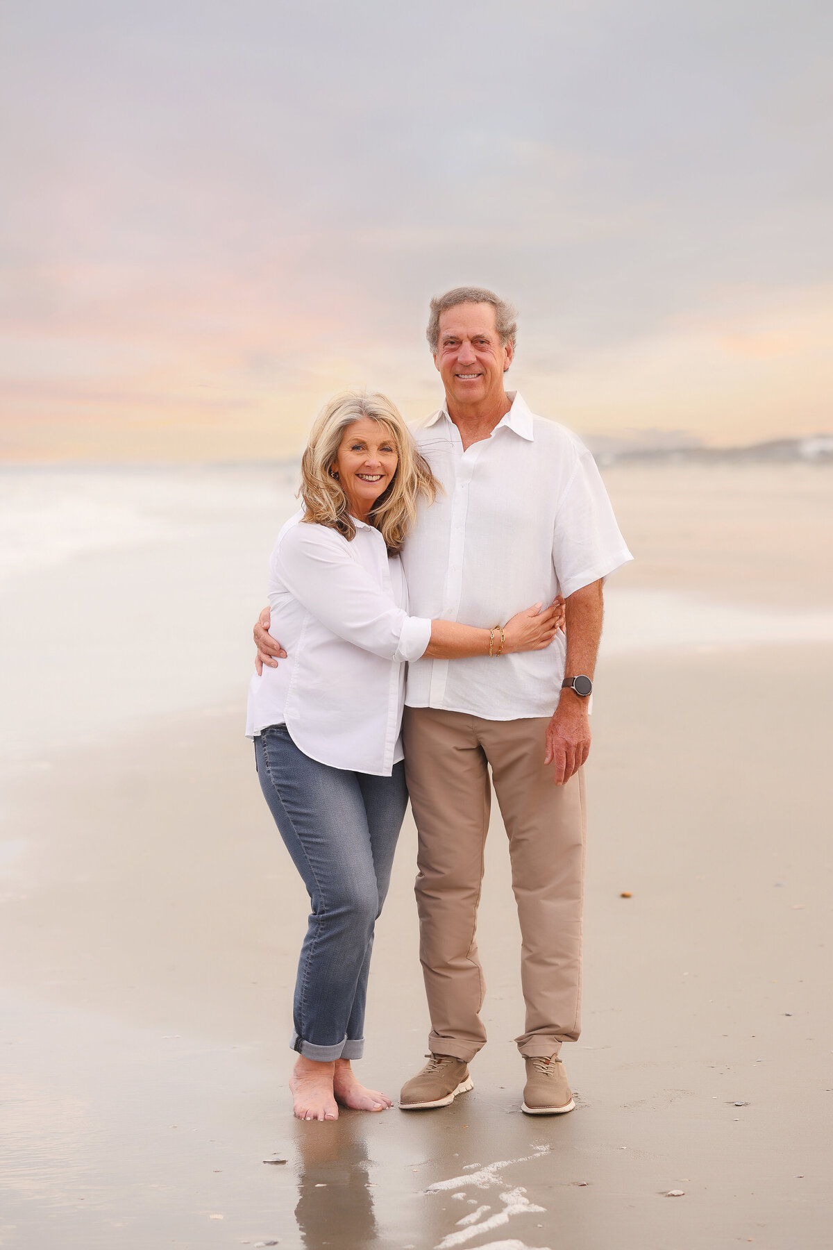 Elderly couple poses for photos during Family Photoshoot on Isle of Palms. 