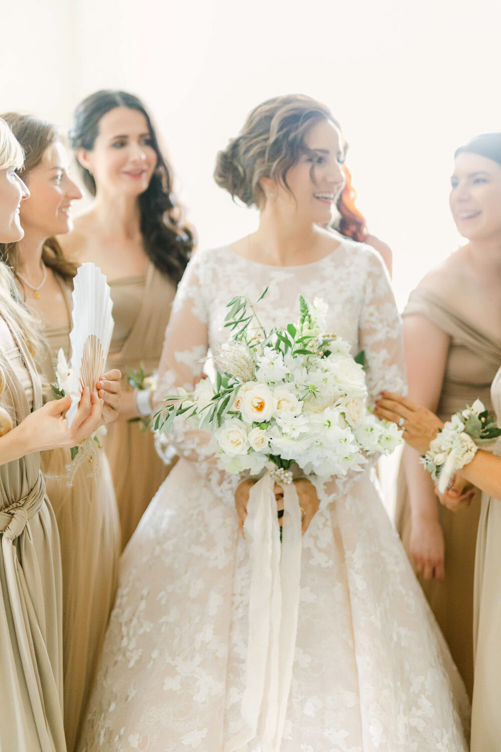 bride and her bridesmaids in elegant colors