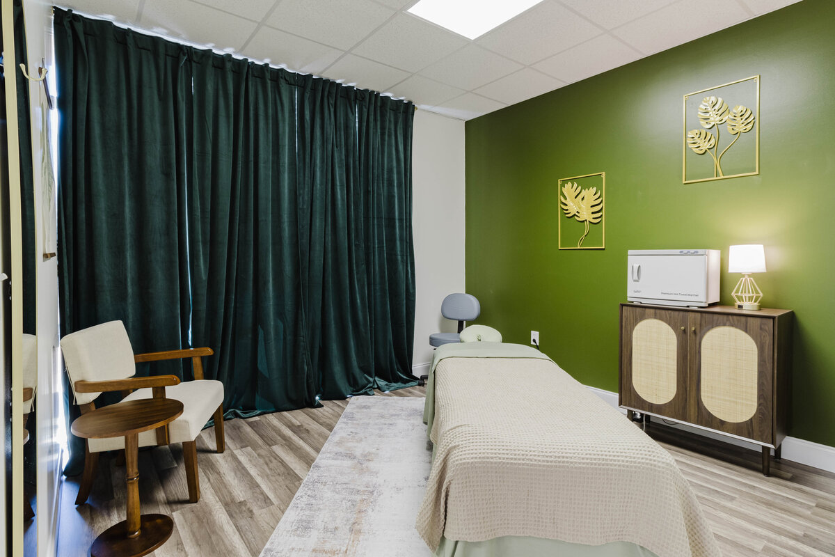 Esthetician treatment room with skincare equipment at LivingTree Wellness Collective, Greenville, SC​