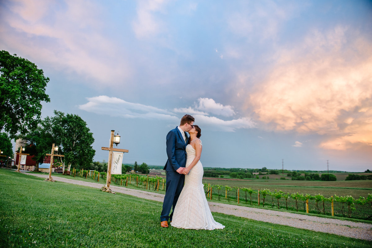 Bride and Groom in front of dramatic sky