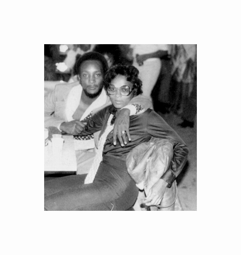black coupe at party in alabama 1970