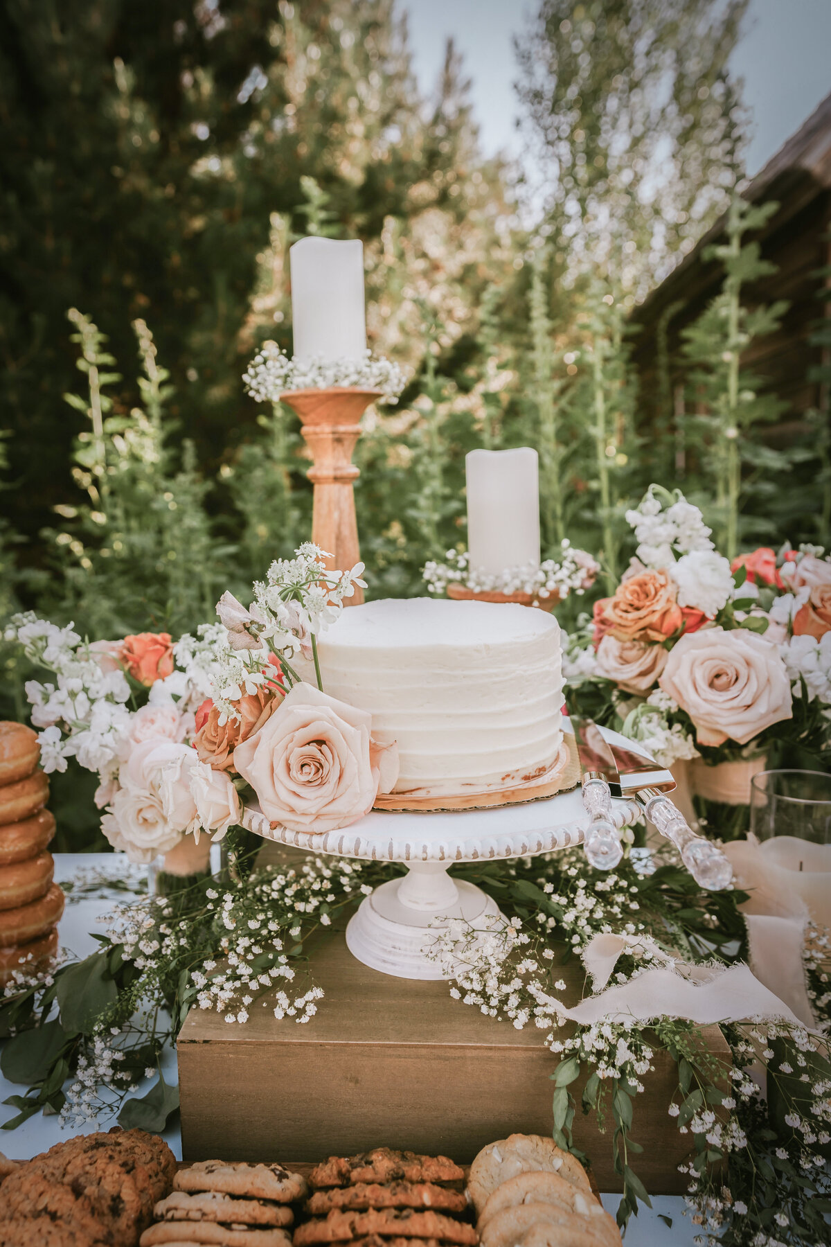 couple's wedding cake with flowers by My Beloved Floral in Treasure Valley, Idaho