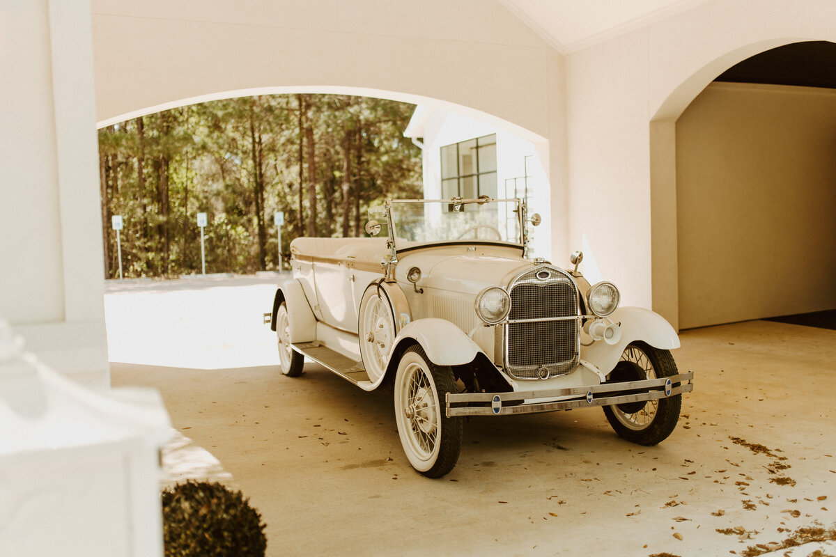 white antique wedding car