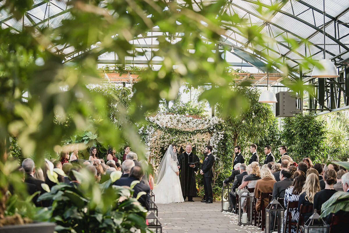 An elegant black tie garden wedding at Planterra Conservatory in West Bloomfield Michigan provided by top rated Metro Detroit wedding photographer Kari Dawson14