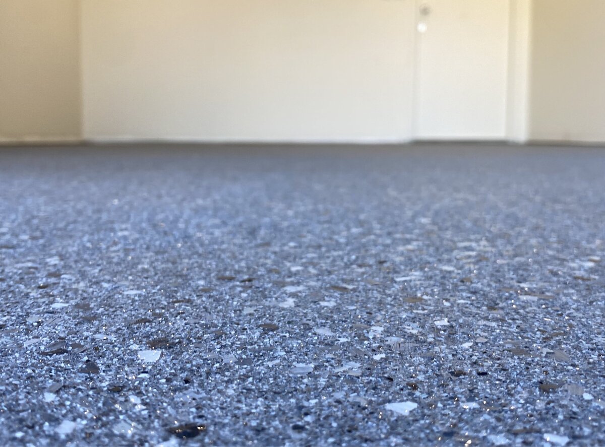 Close up epoxy flooring of a residential garage