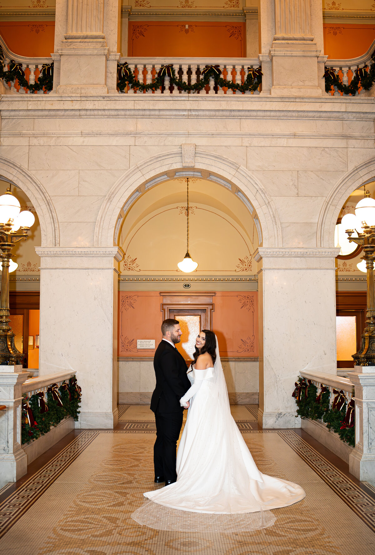 direct flash wedding portrait of couple at Ohio Statehouse in Columbus