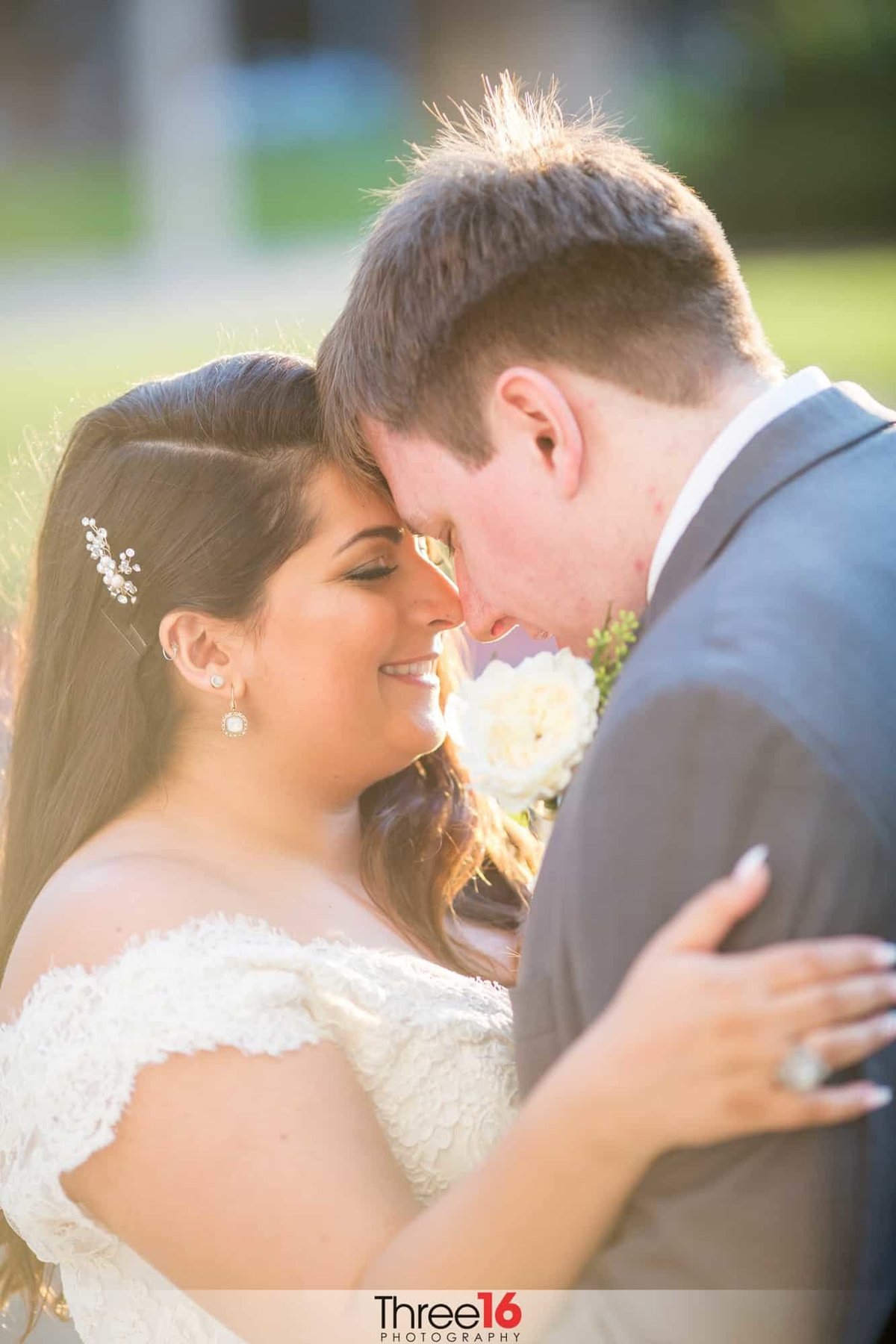 Tender moment between newly married couple