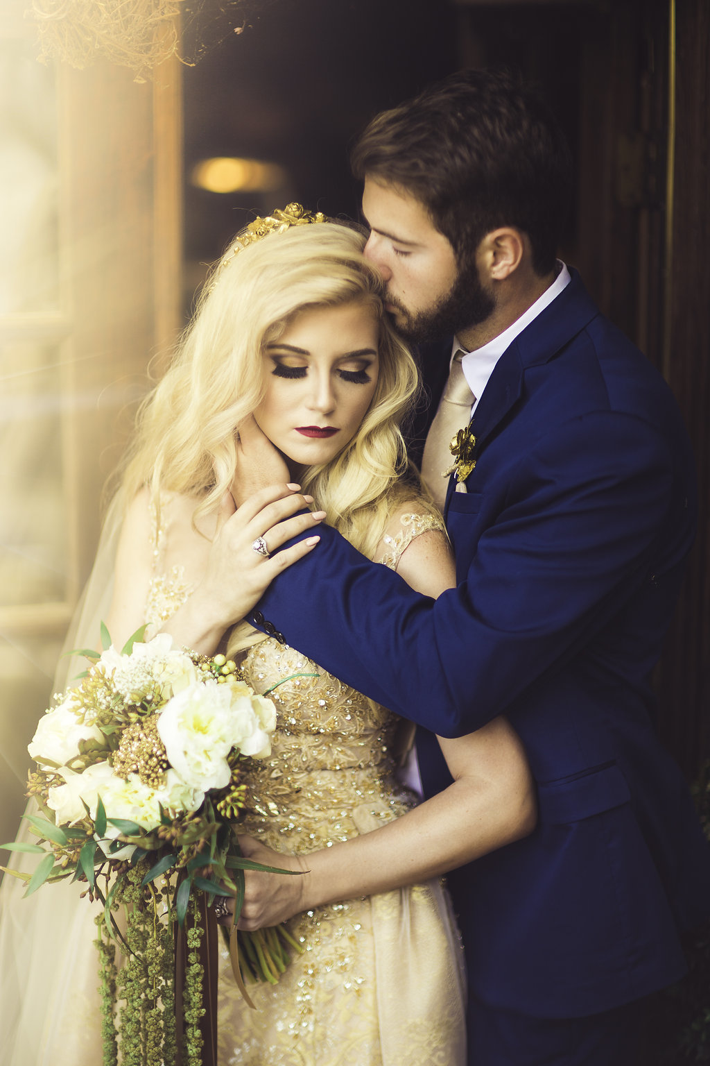 Wedding Photograph Of Groom Hugging His Bride From the Back and Kissing Her Forehead Los Angeles