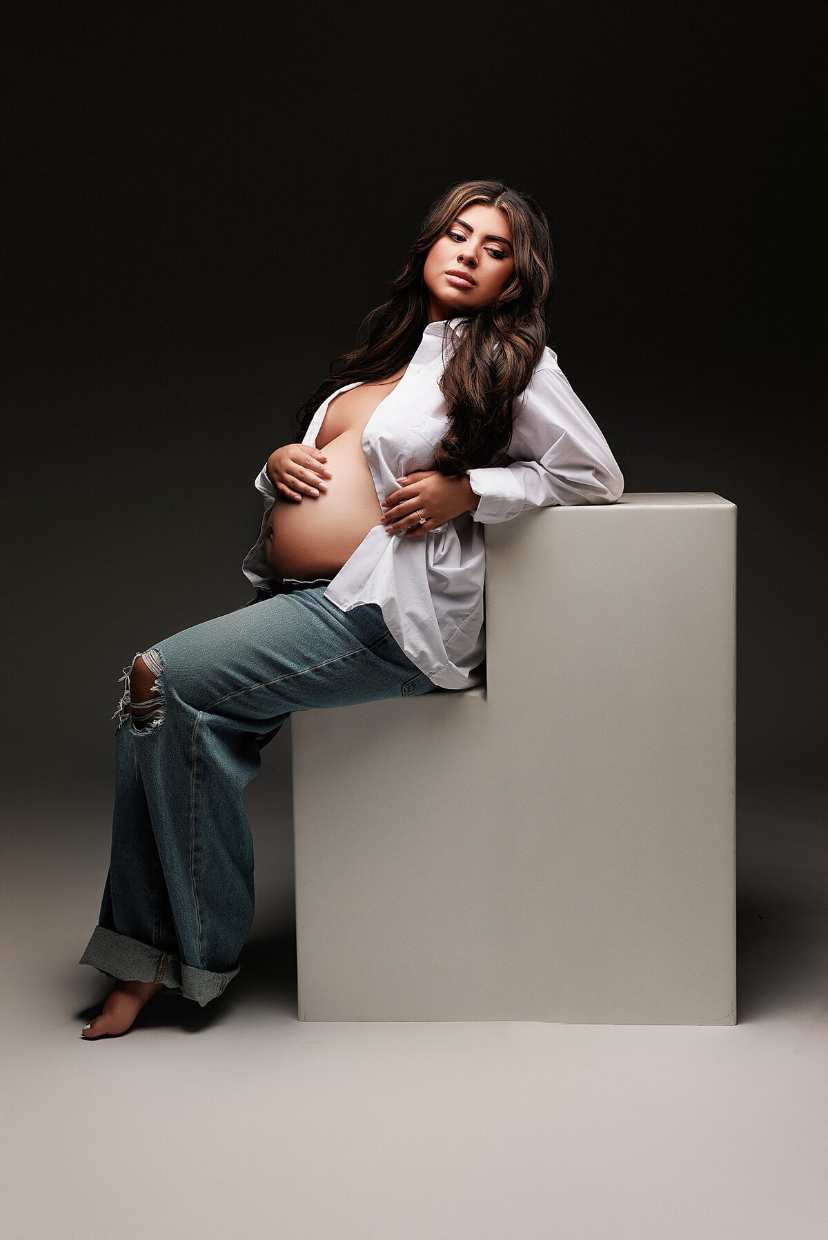 maternity photoshoot in austin where photographer provides all of the wardrobe