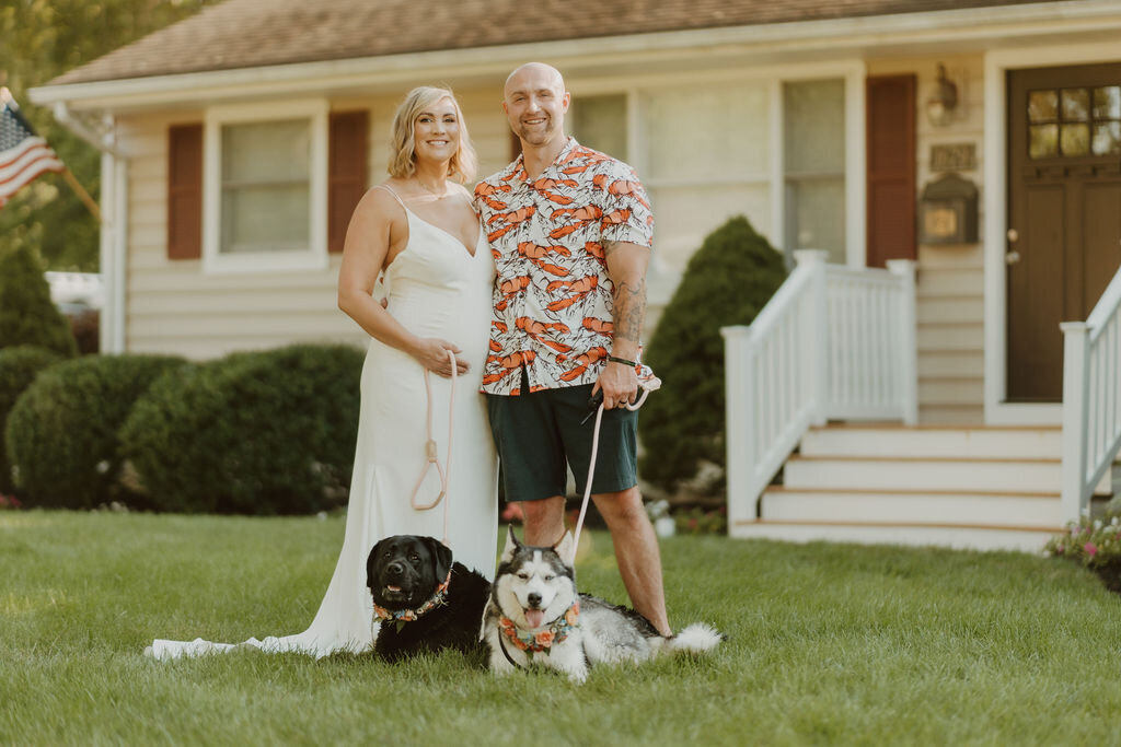 Couples wedding day portraits outside of their home