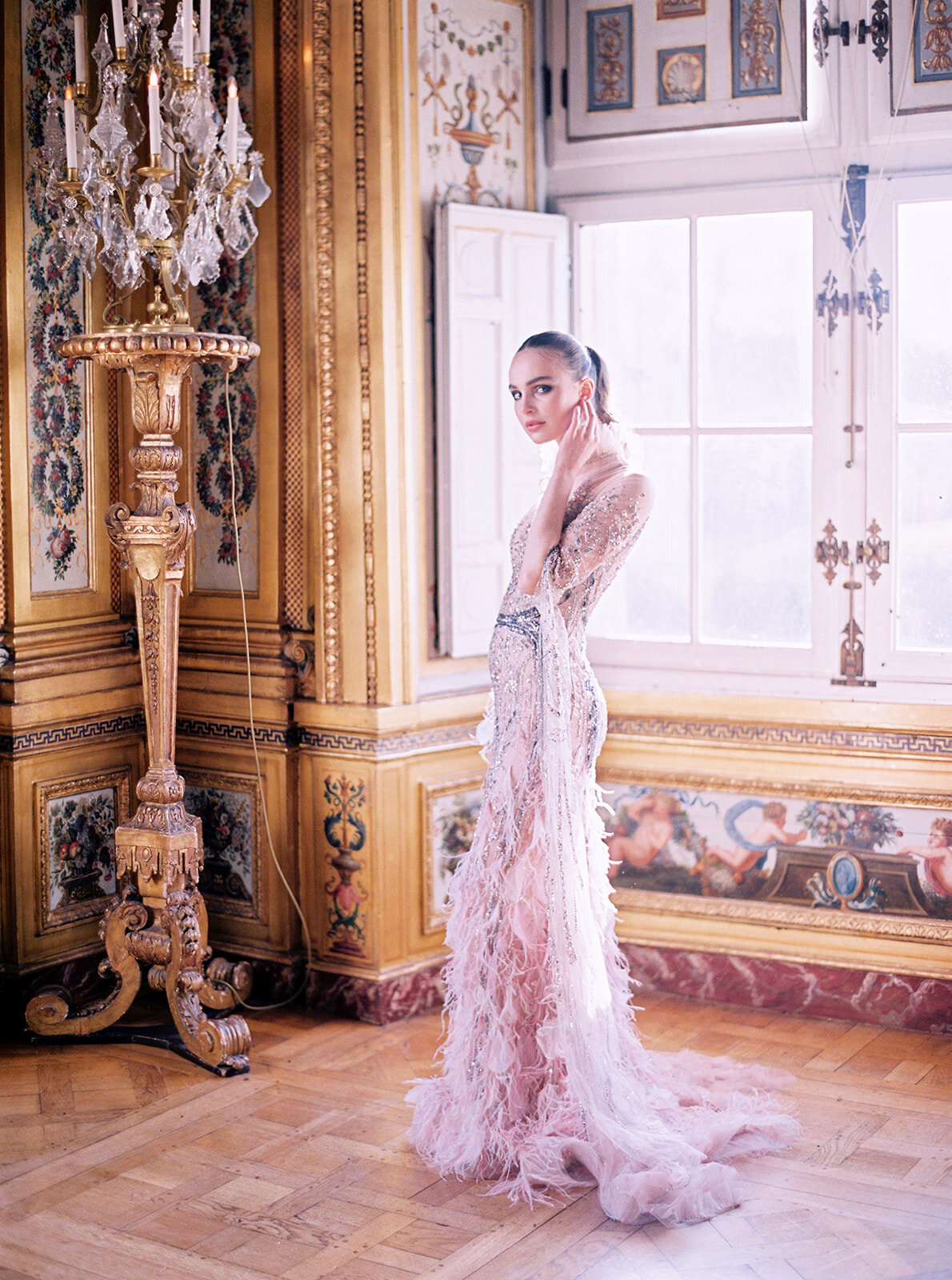 The photo was taken at Paris, France - Chateau Vaux le Vicomte, one of the top destination wedding venues in France, captured beautifully by photographer Audrey FORA. In addition to Audrey FORA's photography, East West Films also offers videography services at the venue.