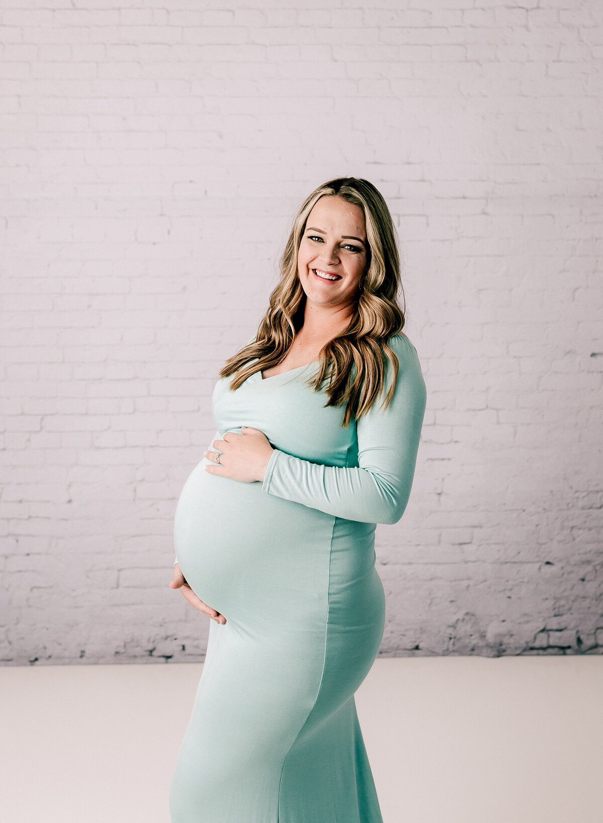 Mint green maternity gown in a photo by Diane Owen.