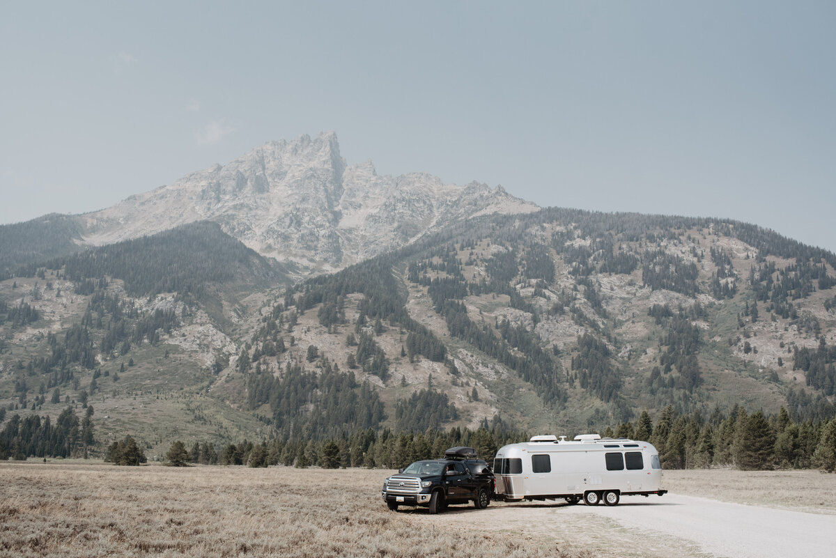 Jackson Hole photographers capture couple's truck parked in front of mountains