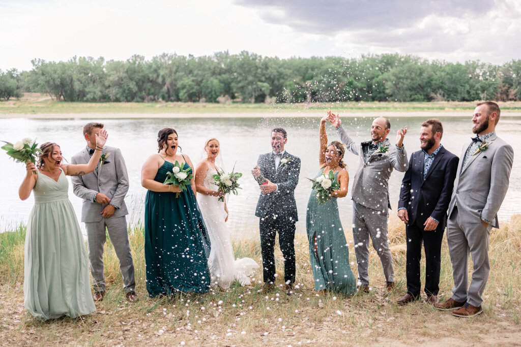 Wedding party by Andrea De Groot Images, vibrant and joyful wedding photographer in Lethbridge, Alberta. Featured on the Bronte Bride Vendor Guide.