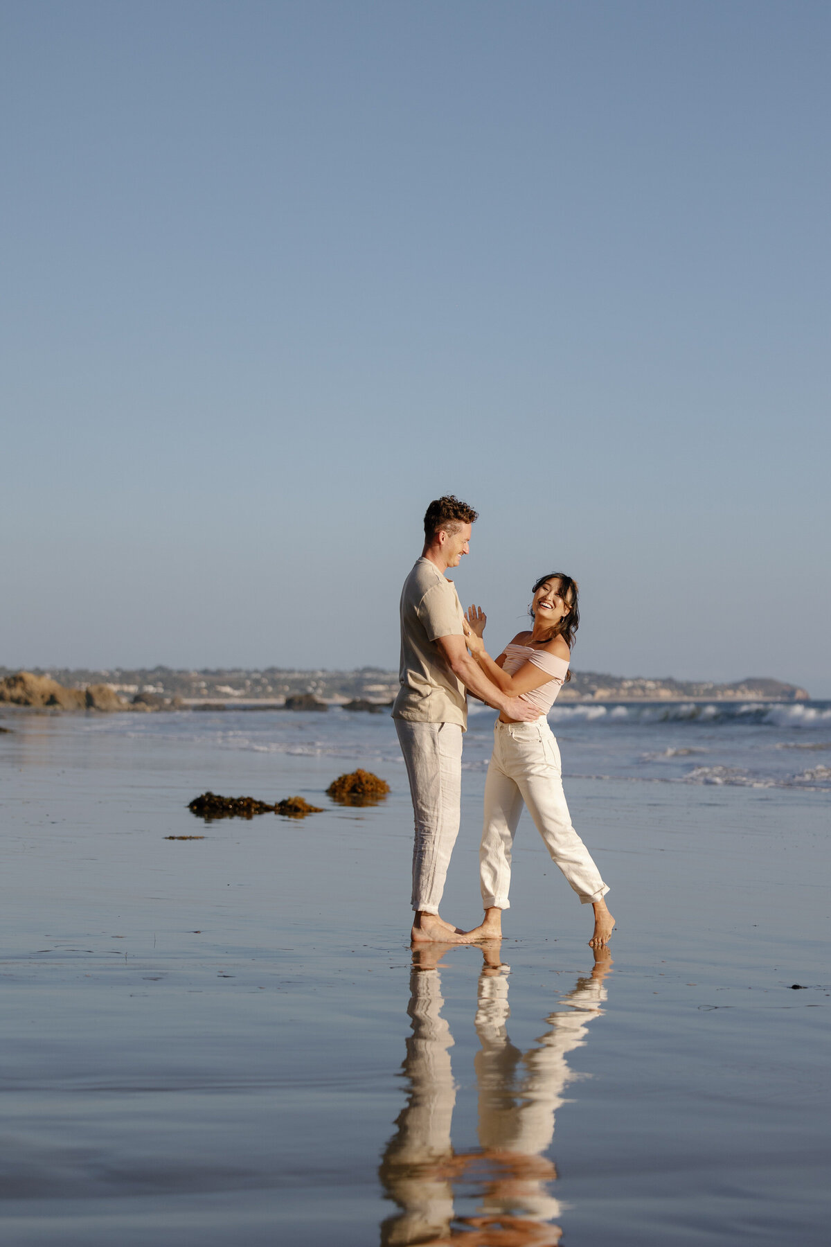 A couple dancing on the beach