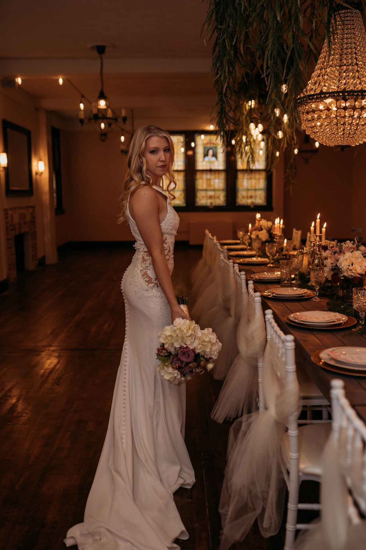 romantic bride next to table at recpetion