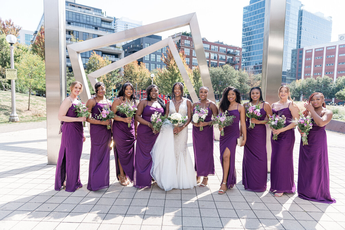 Groom preparing and tying his tie