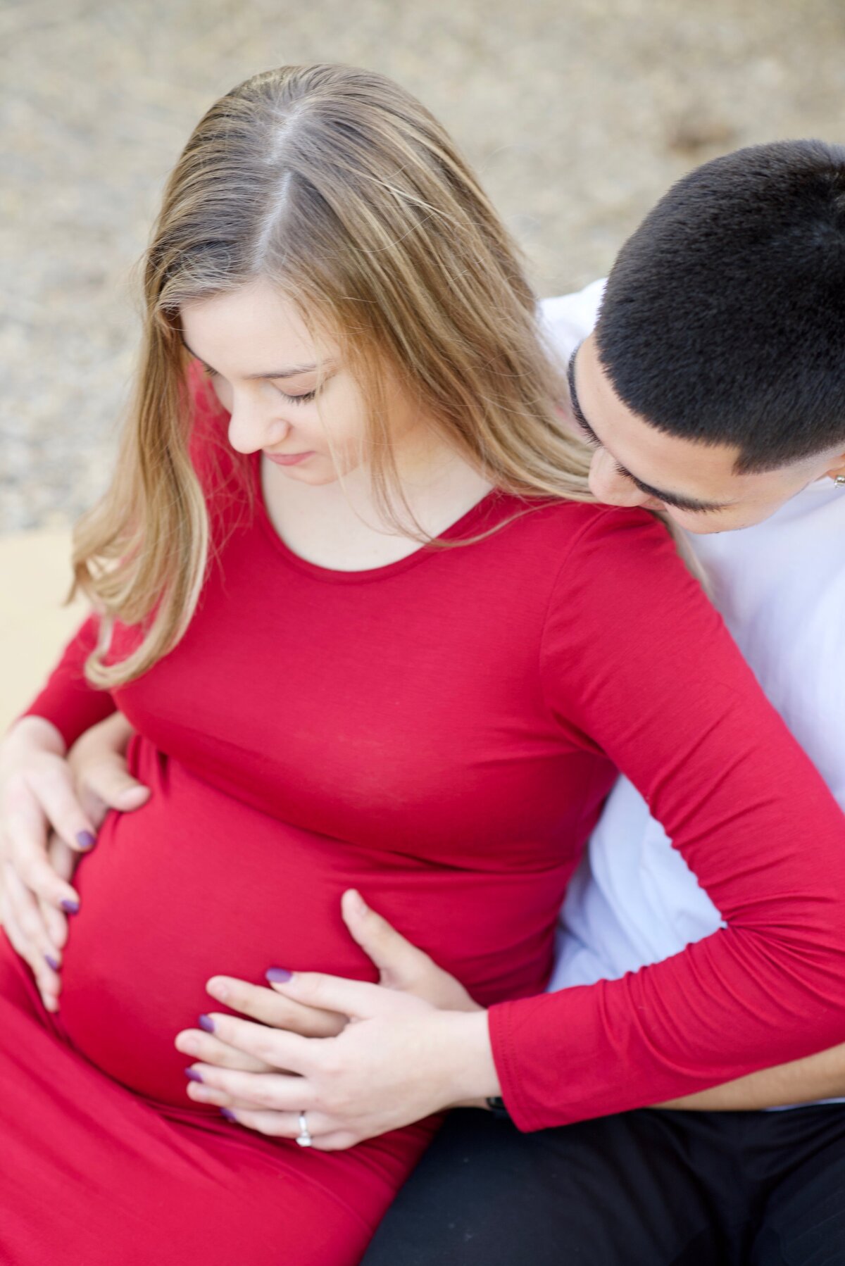 maternity session with red dress