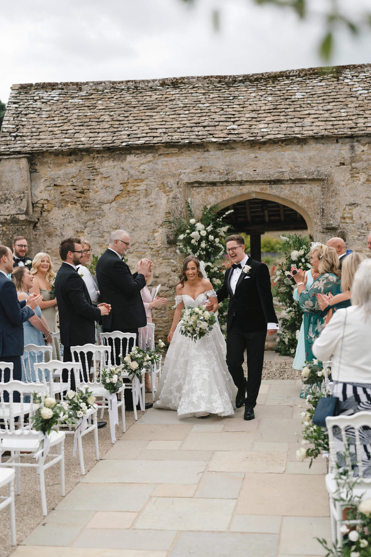 caswell-house-outdoor-ceremony-bride-groom-guests