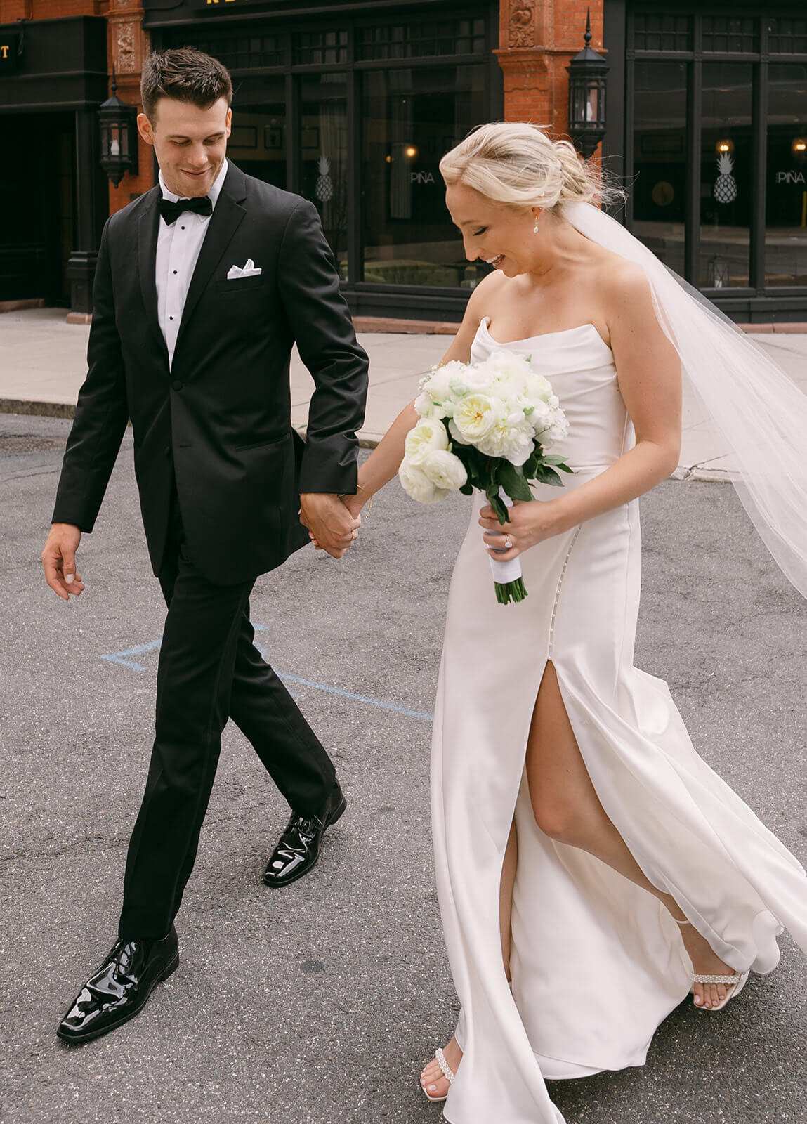 The-bride-and-groom-walking-and-smiling