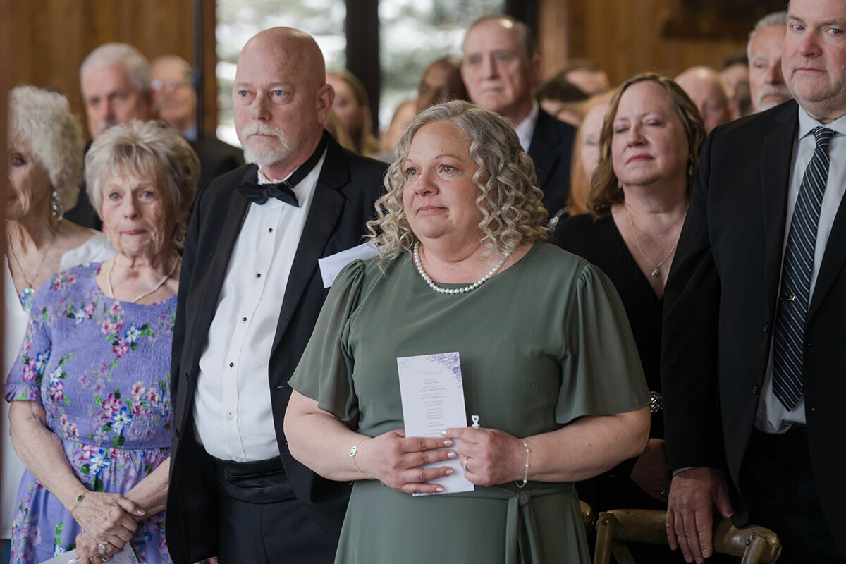 emotional wedding guests at ceremony