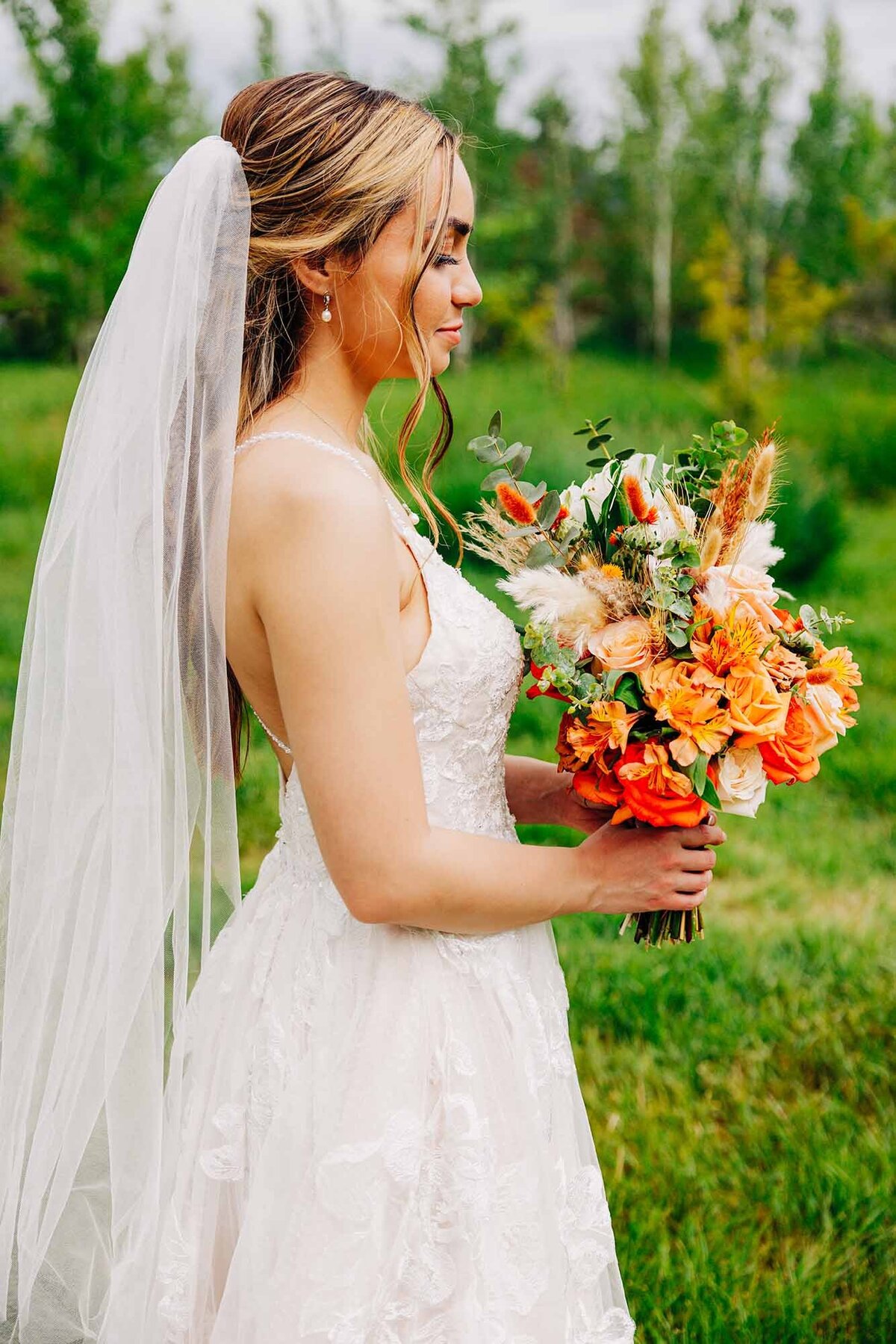 Bride holding bouquet at Shades of Green Events in Helena, MT