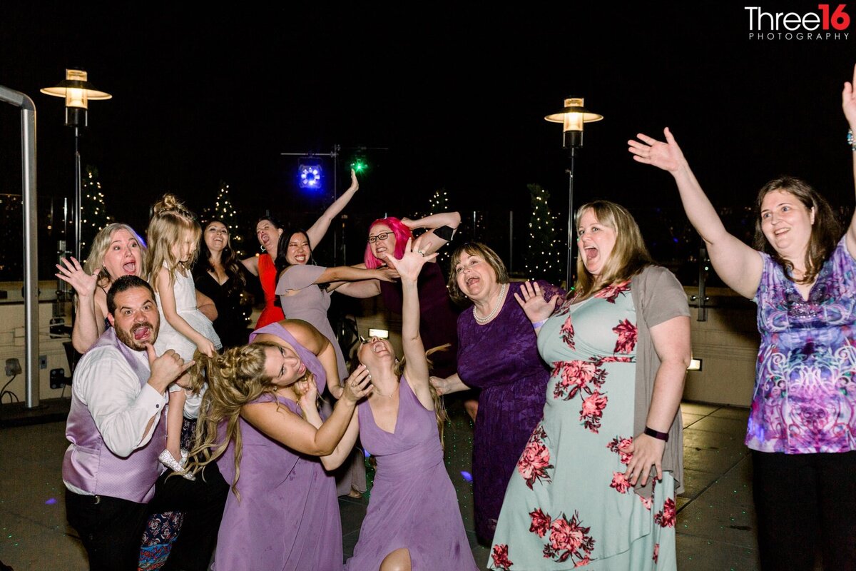 Wedding guests live it up on the dance floor