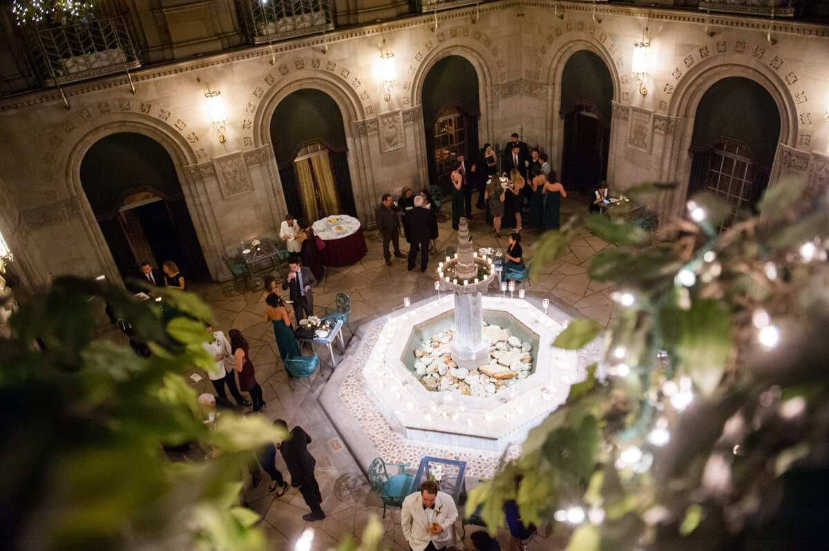 cocktail hour taking place in the courtyard at duquesne club