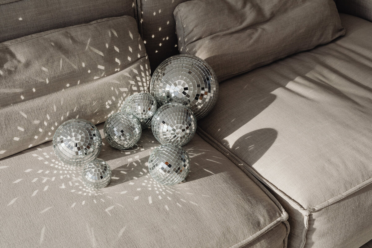 Disco balls on a couch