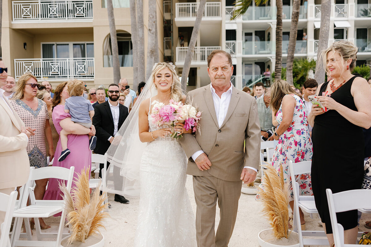 A heartfelt moment as Brenda walks toward Stephen at their Cheeca Lodge wedding.