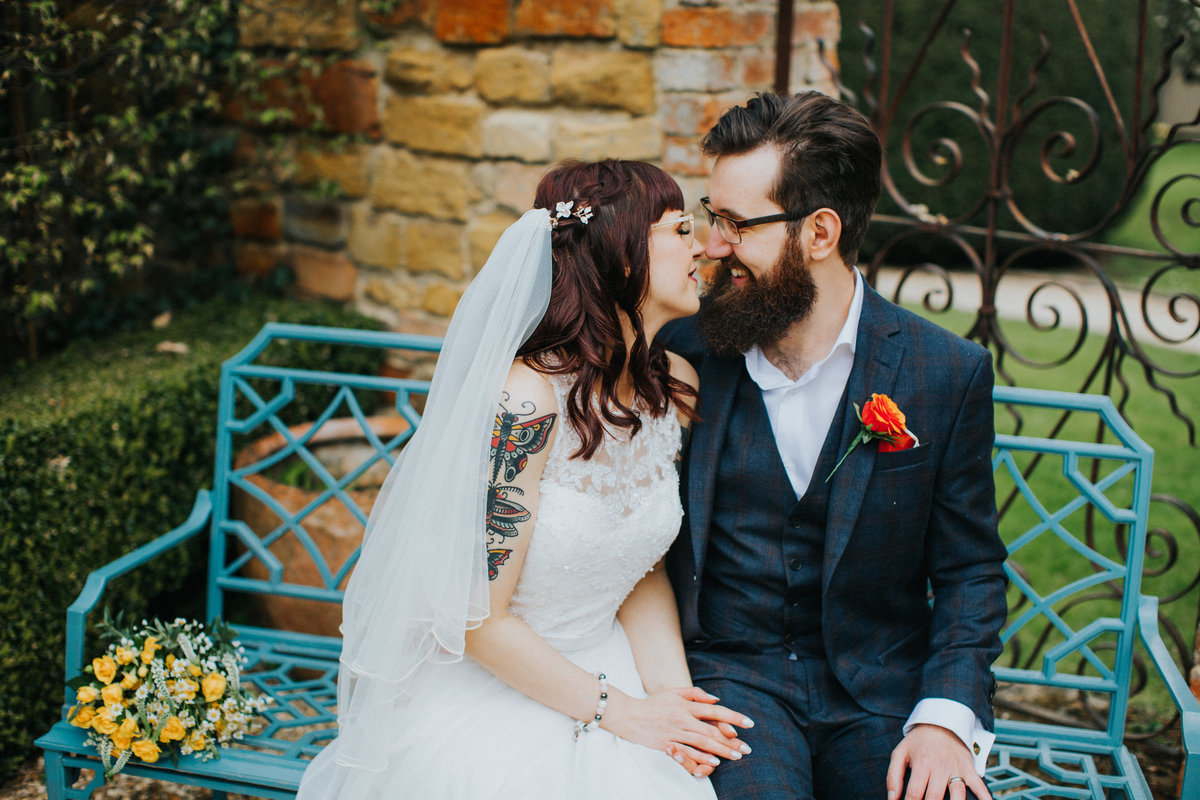 tattooed bride at wedding in the cotswolds