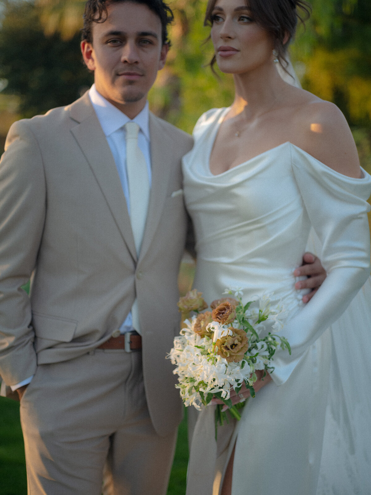 Bride and groom portrait  with bouquet