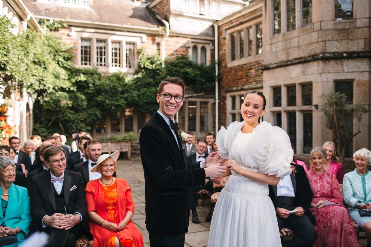 Happy couple getting married in Devon