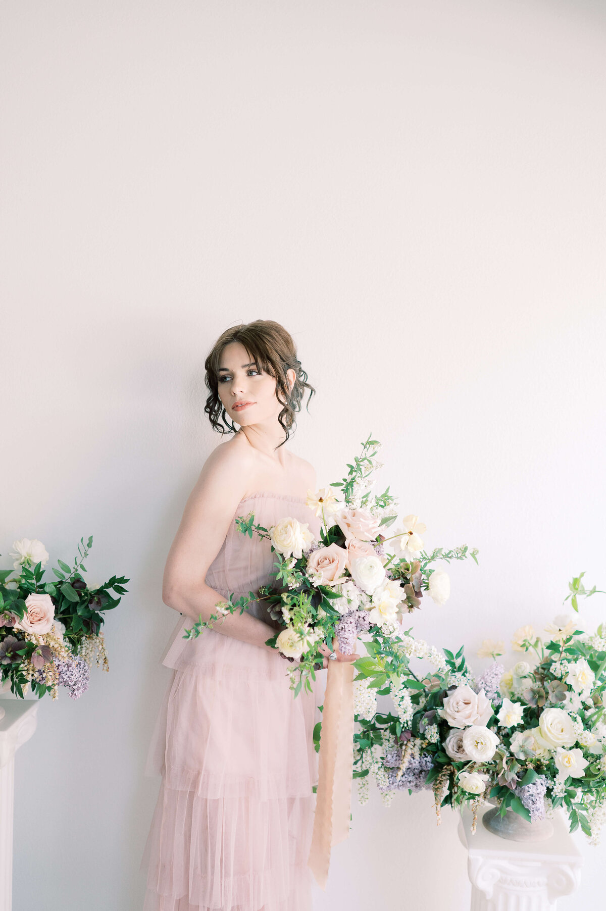 bride in tulle dress with florals