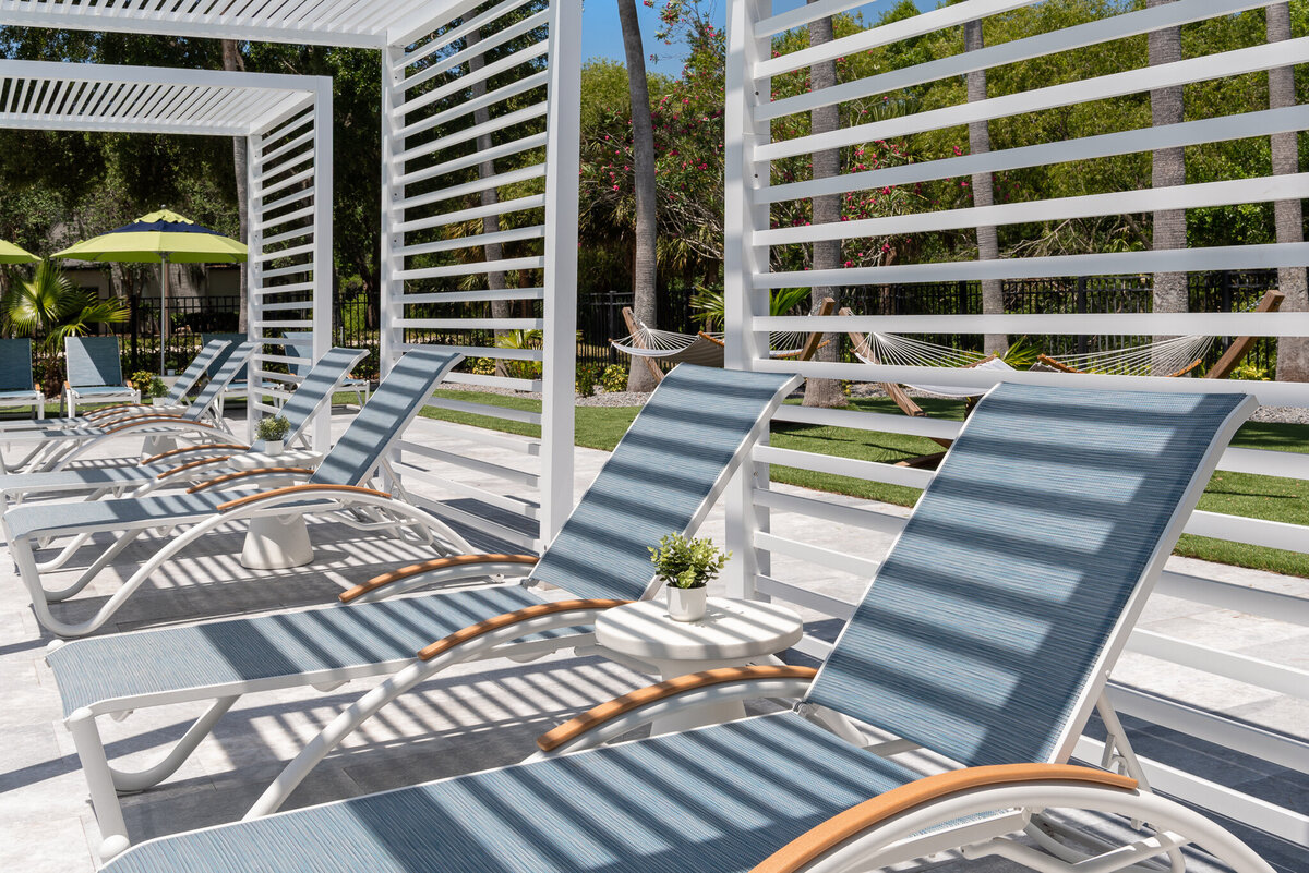 loungers in a cabana by interior designer