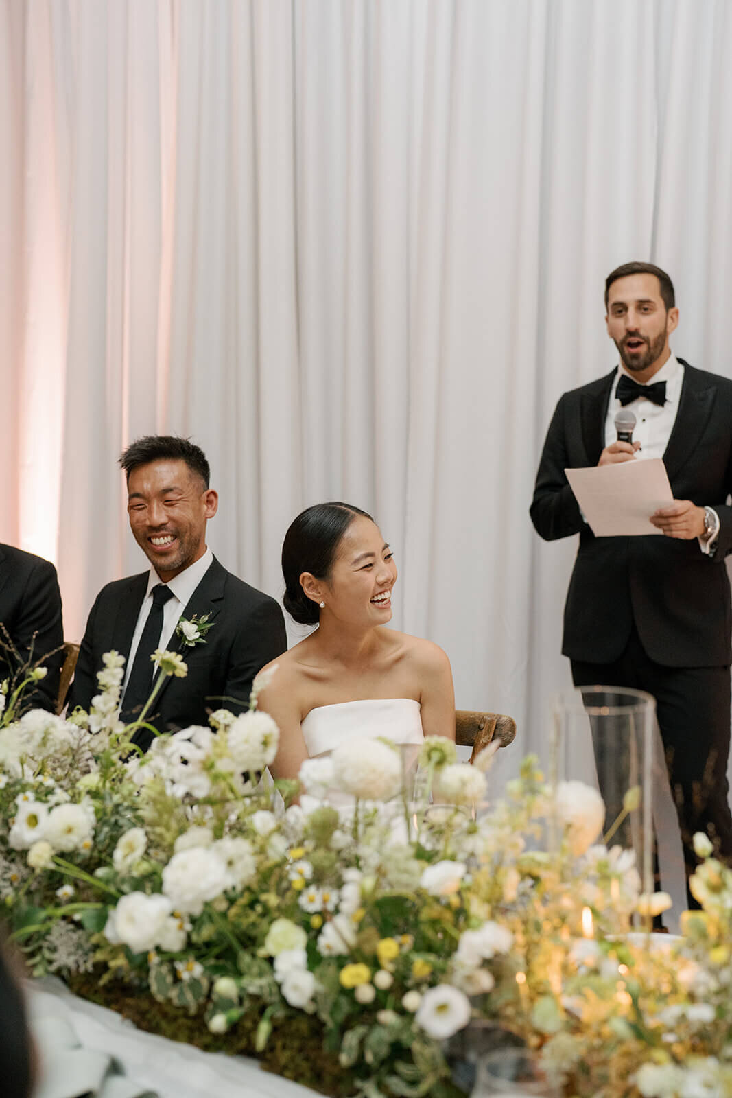 The groom's best man delivers a speech at the Aspen Meadows Resort wedding reception venue.