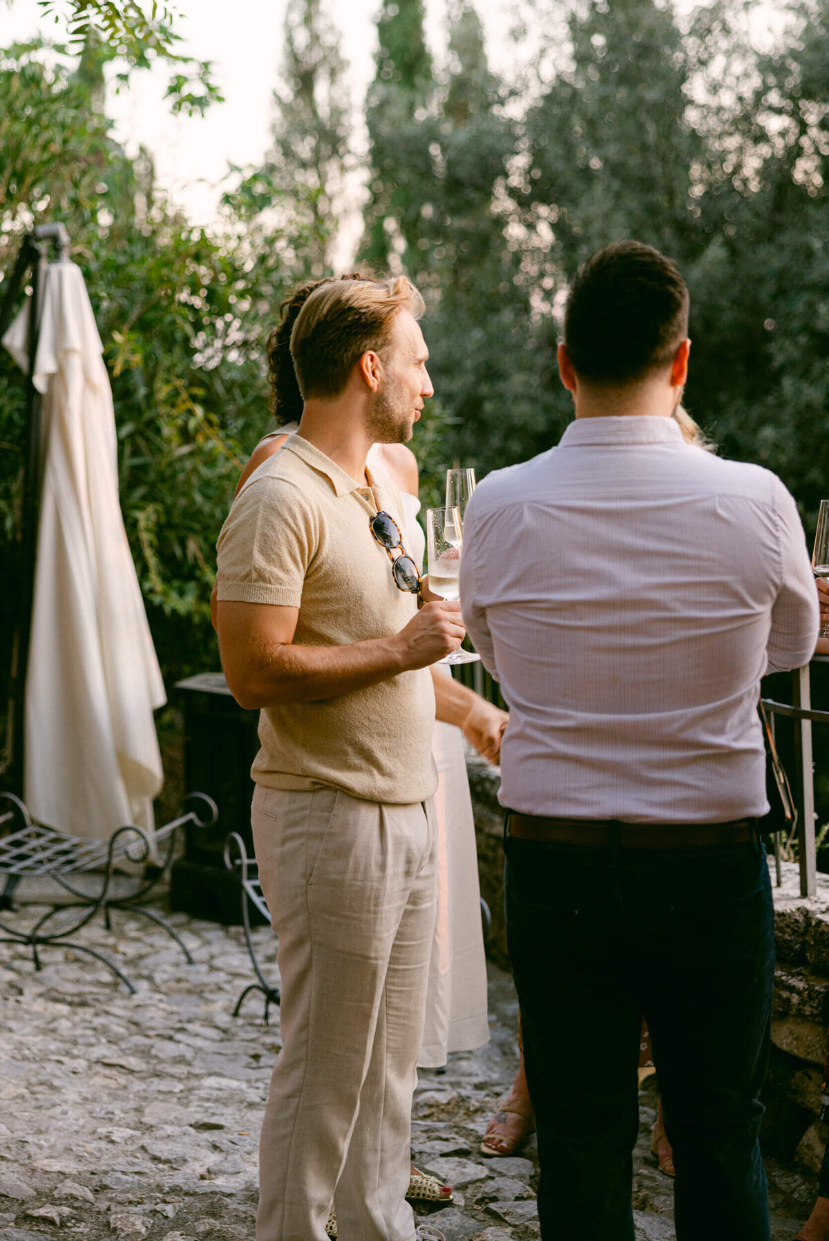 A wedding photo of the venue Laticastelli during cocktail hour in aTuscany Italy